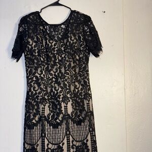 Elegant Black Lace Dress pre-owned